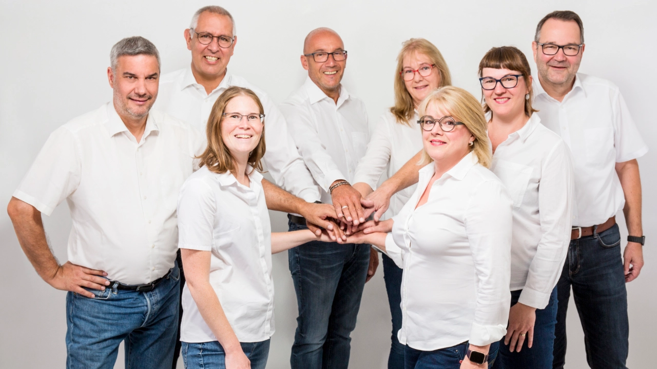 Unser Team in vereinter Pose